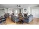 Spacious living room with hardwood floors, a fireplace, and an open layout, perfect for entertaining at 649 Hummingbird Dr, Brownsburg, IN 46112