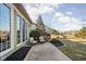 Back patio features outdoor seating, landscaping and views of the backyard at 649 Hummingbird Dr, Brownsburg, IN 46112