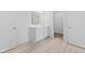 Bathroom showcasing double vanity sinks and bright lighting at 6890 Enclave Dr, McCordsville, IN 46055
