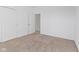 Bedroom featuring neutral carpet, a doorway, and closet with bright white walls at 6890 Enclave Dr, McCordsville, IN 46055