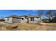 Charming single-story home with a stone and brick facade, complemented by ample windows and a well-maintained front lawn at 6890 Enclave Dr, McCordsville, IN 46055