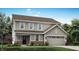 Charming two-story home featuring a front-facing garage, landscaped yard, and classic curb appeal at 7225 Estes Dr, Indianapolis, IN 46239