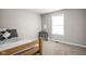 Simple bedroom featuring a bed, neutral walls, and a window providing natural light at 762 Courtney Cir, Danville, IN 46122