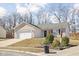 Inviting one-story home with a manicured lawn and an attached two-car garage at 762 Courtney Cir, Danville, IN 46122