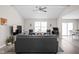 Bright living room with vaulted ceiling, neutral colors, and large windows at 762 Courtney Cir, Danville, IN 46122