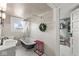 Elegant bathroom with a clawfoot tub and an adjacent closet at 83 W Garfield Ave, Martinsville, IN 46151