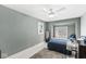 Bright bedroom featuring a large window seat, neutral decor, and hardwood floors for a relaxing retreat at 83 W Garfield Ave, Martinsville, IN 46151