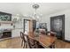 Elegant dining area featuring a unique wooden table and stylish decor at 83 W Garfield Ave, Martinsville, IN 46151