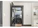 Convenient laundry room with modern appliances, shelving, and stylish decor at 83 W Garfield Ave, Martinsville, IN 46151