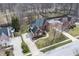Expansive home featuring a private pool, manicured lawns, and a lush, green environment at 9914 Springstone Rd, Fishers, IN 46055