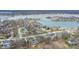Stunning aerial view of a lakeside community featuring beautiful homes and waterfront access at 9914 Springstone Rd, Fishers, IN 46055