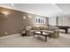 Finished basement with a sectional couch, a pool table, recessed lights, and neutral colored walls at 9914 Springstone Rd, Fishers, IN 46055