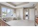 Spacious bedroom featuring neutral walls, a teepee, and a large window overlooking the neighborhood at 9914 Springstone Rd, Fishers, IN 46055