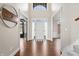 Elegant foyer featuring hardwood floors, high ceilings, and abundant natural light at 9914 Springstone Rd, Fishers, IN 46055