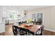 Kitchen featuring white cabinets, granite countertops, stainless steel appliances and dining area at 9914 Springstone Rd, Fishers, IN 46055