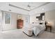 Main bedroom with carpet, natural light and decorative tray ceiling at 9914 Springstone Rd, Fishers, IN 46055