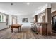 Finished basement features a pool table, bar area, and an open floor plan for entertaining at 10541 Titan Run, Carmel, IN 46032