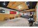 Finished basement with wood paneled walls, carpeted floor and drop ceiling tiles at 10887 Gresham Pl, Noblesville, IN 46060