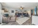 Cozy living room featuring fireplace, comfortable seating, and modern decor at 10887 Gresham Pl, Noblesville, IN 46060