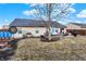 A lovely backyard with a stone patio and cozy furniture, perfect for entertaining at 12689 Sovereign Ln, Fishers, IN 46038