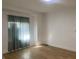Simple bedroom featuring hardwood flooring and bright neutral walls with natural light at 1310 N Lasalle St, Indianapolis, IN 46201