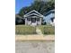 Traditional home with a well-maintained lawn and inviting front yard at 1310 N Lasalle St, Indianapolis, IN 46201