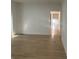 Bright interior hallway with hardwood flooring and clear sightlines to other living spaces at 1310 N Lasalle St, Indianapolis, IN 46201