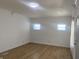 Bright living room featuring hardwood floors, neutral walls, and lots of natural light at 1310 N Lasalle St, Indianapolis, IN 46201