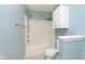 Bright bathroom featuring a shower-tub combination with storage at 1325 E 47Th St, Anderson, IN 46013