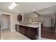 Modern kitchen with stainless steel appliances and an open design to the living room at 1325 E 47Th St, Anderson, IN 46013