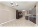 Eat-in kitchen with stainless steel appliances and a view to the living area at 1325 E 47Th St, Anderson, IN 46013