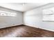 Bright bedroom with hardwood floors and neutral walls at 1401 Castle Ave, Indianapolis, IN 46227