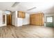 Bonus room with light wood flooring, built-in storage, and a bright window at 1401 Castle Ave, Indianapolis, IN 46227