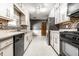 This galley-style kitchen offers ample counter space and modern appliances at 1401 Castle Ave, Indianapolis, IN 46227