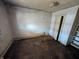 Bedroom with hardwood floors and plenty of room; ready for renovation and design at 1610 Central Ave, Anderson, IN 46016