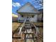 Traditional home exterior showcasing a covered porch and welcoming entrance, ideal for a Gathering at 1610 Central Ave, Anderson, IN 46016