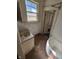 Bathroom featuring a window, sink, bathtub, and cracked walls at 1709 Central Ave, Anderson, IN 46016