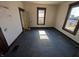Bedroom featuring hardwood floors and natural light at 1709 Central Ave, Anderson, IN 46016