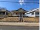 Classic home exterior with a covered porch and inviting curb appeal at 1709 Central Ave, Anderson, IN 46016