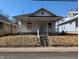 Charming single-Gathering home featuring a quaint front porch at 1709 Central Ave, Anderson, IN 46016