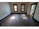 Living room featuring hardwood floors and natural light at 1709 Central Ave, Anderson, IN 46016