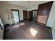 Spacious living room featuring hardwood floors and open doorways at 1709 Central Ave, Anderson, IN 46016