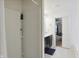 Bathroom featuring a stand-up shower and single sink vanity at 2091 Creek Bank Dr, Columbus, IN 47201