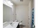 Bright bathroom features a single sink vanity and a framed mirror at 2091 Creek Bank Dr, Columbus, IN 47201