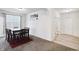 Cozy dining area featuring table seating for six with neutral walls and natural light at 2091 Creek Bank Dr, Columbus, IN 47201