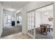 Inviting entryway with a view of the living room and a doorway to a game room at 2091 Creek Bank Dr, Columbus, IN 47201
