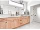 Modern bathroom with an extra-long double vanity, and sleek lighting at 2117 Broadway St, Indianapolis, IN 46202