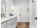 Bright bathroom with white cabinets, quartz countertop, and a modern sink at 2117 Broadway St, Indianapolis, IN 46202