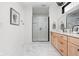Stylish bathroom featuring a patterned-tile shower, floating vanity, and modern fixtures at 2117 Broadway St, Indianapolis, IN 46202