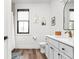 Chic bathroom showcasing a modern vanity, beautiful mirror, and stylish decor at 2117 Broadway St, Indianapolis, IN 46202